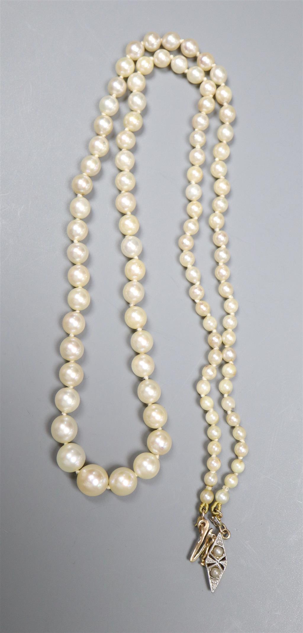 A single strand cultured pearl necklace with yellow metal clasp and a pair of 9ct gold and cultured pearl earrings,